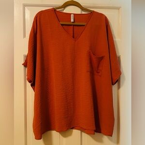 Zenana Outfitters V-Neck Airflow Short Sleeve Top in Rust